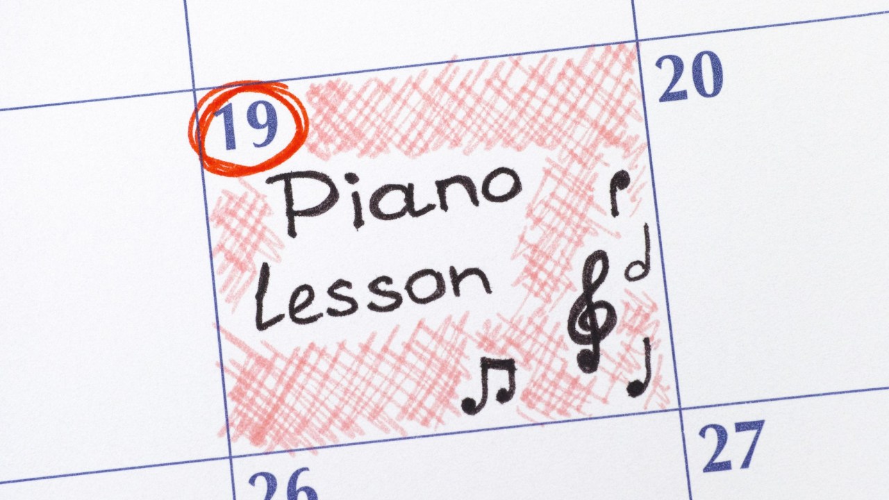 Reminder Piano Lesson in calendar. Close-up.